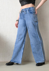 Pale Azure Pull-On Wide Jeans – Light Blue Wide-Leg Jeans Model View – Glossia Fashion
